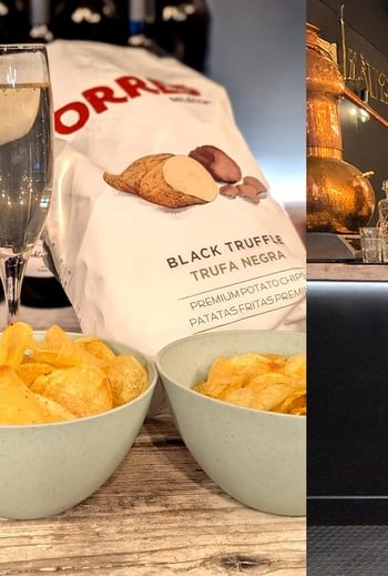 Emma Wine lady with crisps and pic of distillery VY