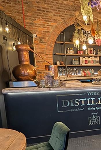 York distillery wine tasting with logos vy hero